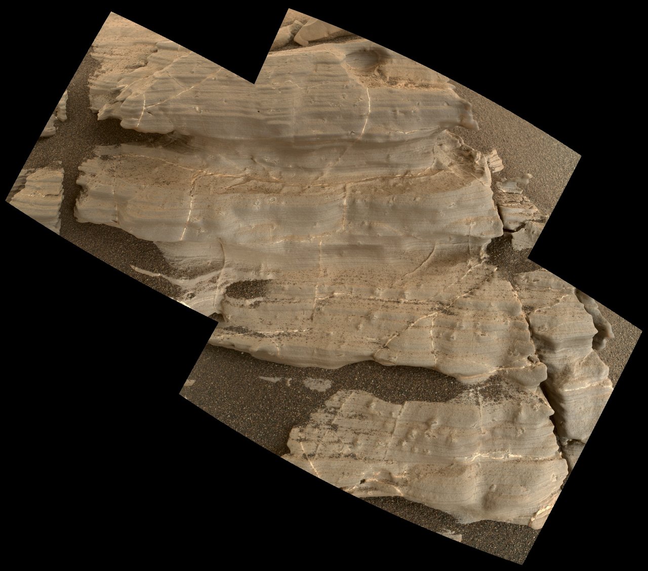 This exposure of finely laminated bedrock on Mars includes tiny crystal-shaped bumps, plus mineral veins with both bright and dark material. This rock target, called "Jura," was imaged by the MAHLI camera on NASA's Curiosity Mars rover on Jan. 4, 2018, during Sol 1925 of the mission. Credits: NASA/JPL-Caltech/MSSS
Full image and caption
