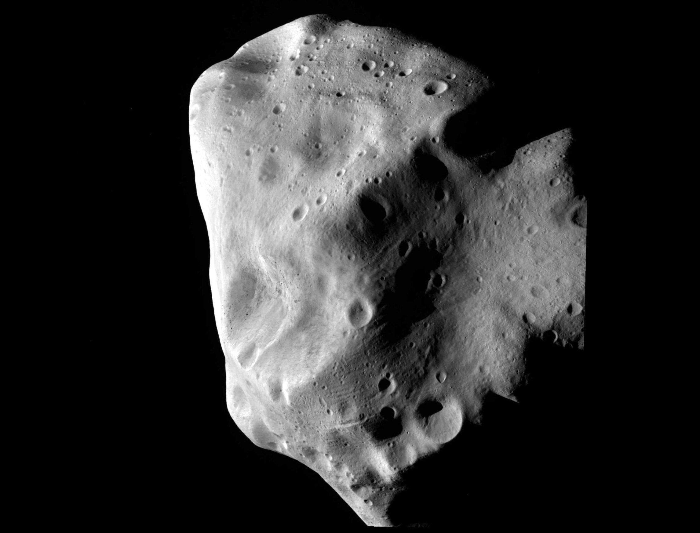 lumpy asteroid in blackness of space