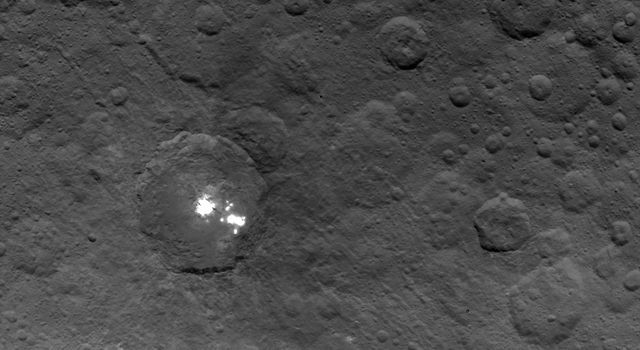 Bright Spots and Color Differences Revealed on Ceres 