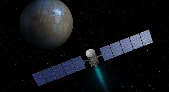 This artist's concept shows NASA's Dawn spacecraft heading toward the dwarf planet Ceres.