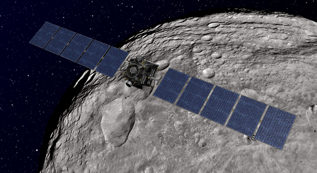 This artist's concept shows NASA's Dawn spacecraft orbiting the giant asteroid Vesta.