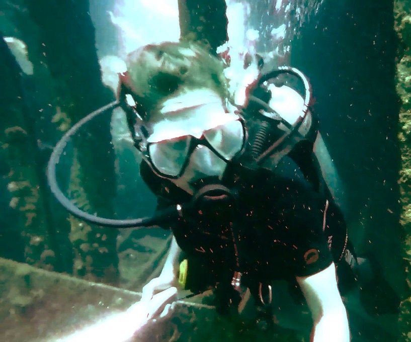 Heather underwater in Scuba gear.