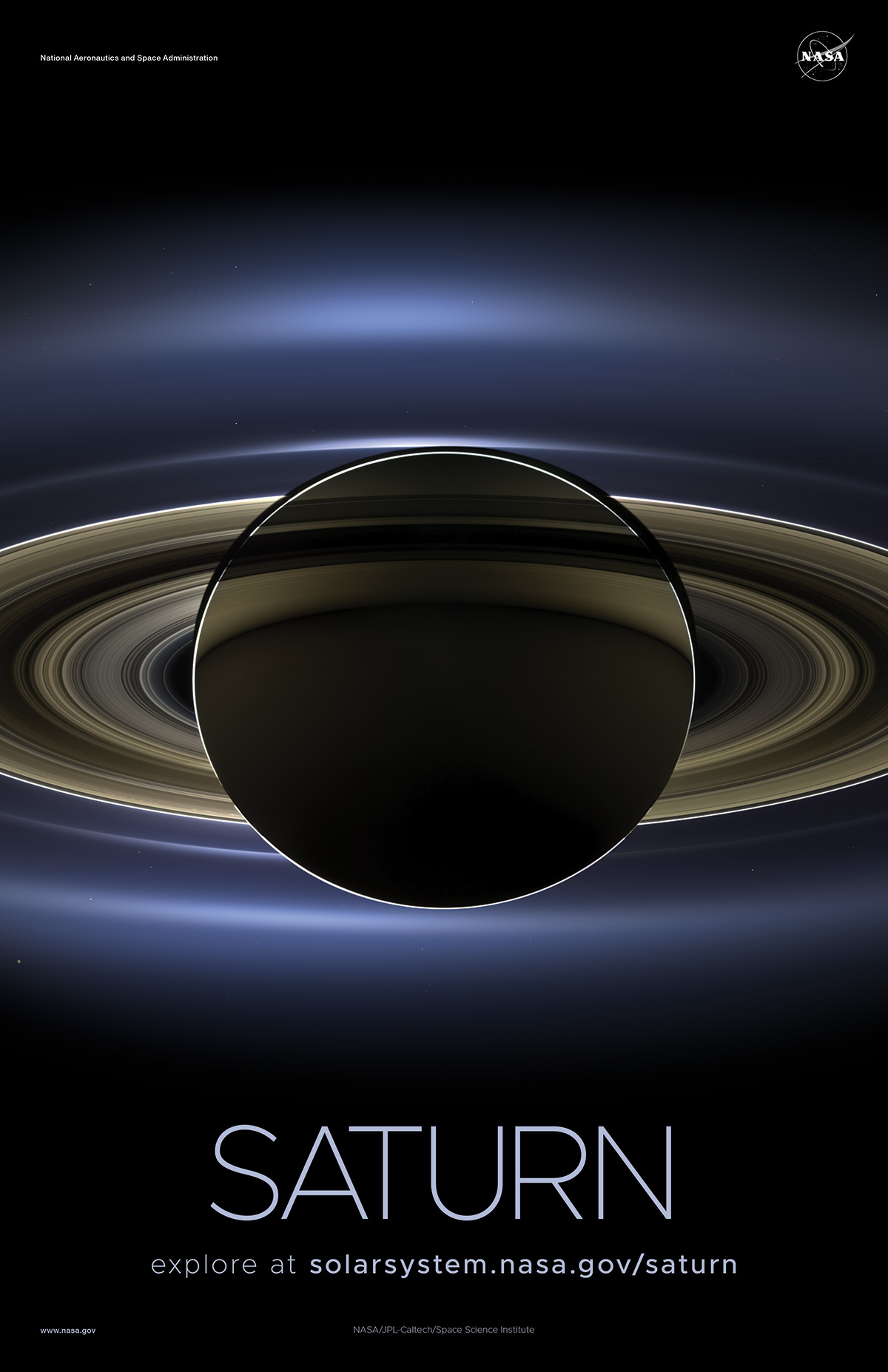 Saturn and its rings backlit by the Sun.