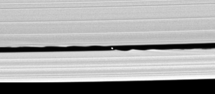 The small moon S/2005 S1 in orbit within the Keeler gap in Saturn's rings