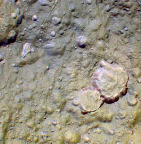 a false-color closeup image of Tethys