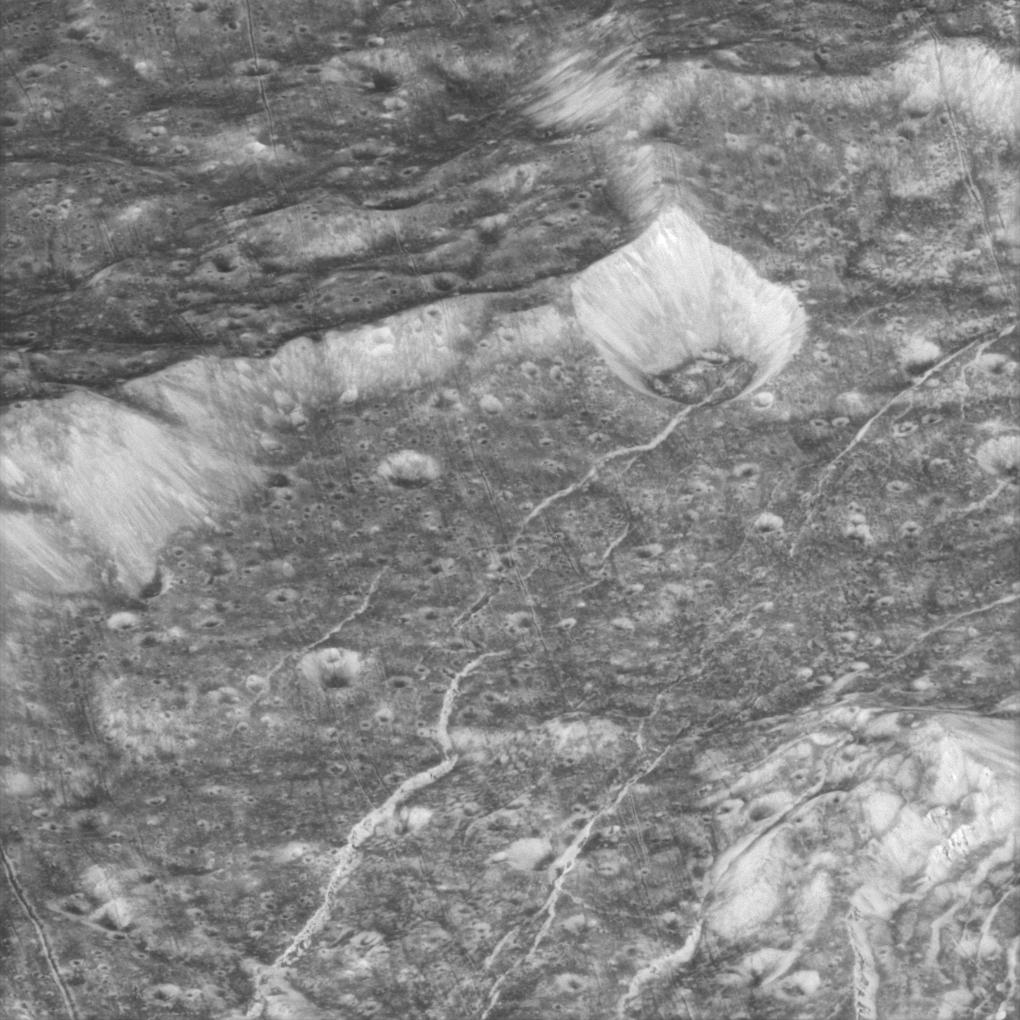 a closeup image of Dione's surface