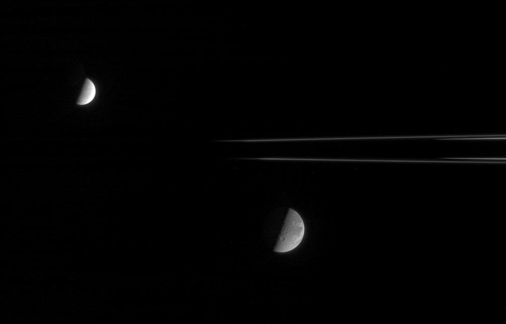 Enceludus and Dione near a portion of Saturn's rings
