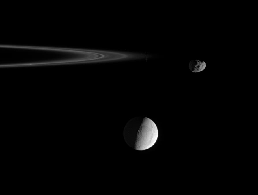 Enceladus, Janus, at right, and the outer edge of the F ring