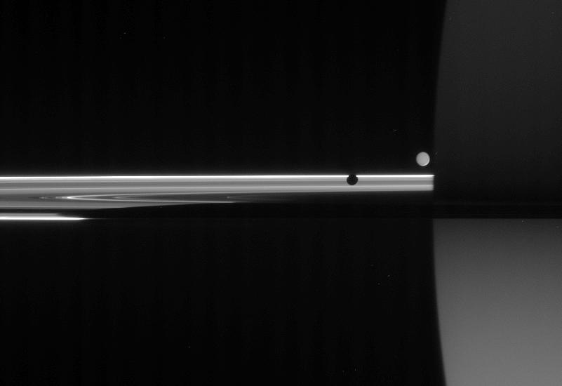 Saturn, its rings, Mimas and Enceladus