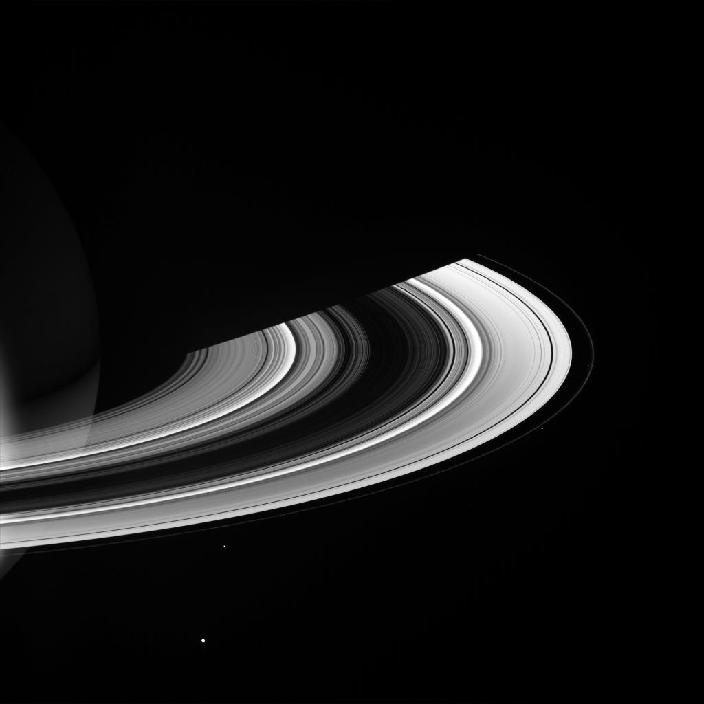 Saturn's brilliant rings and the moons Mimas, Janus, Pandora and Prometheus