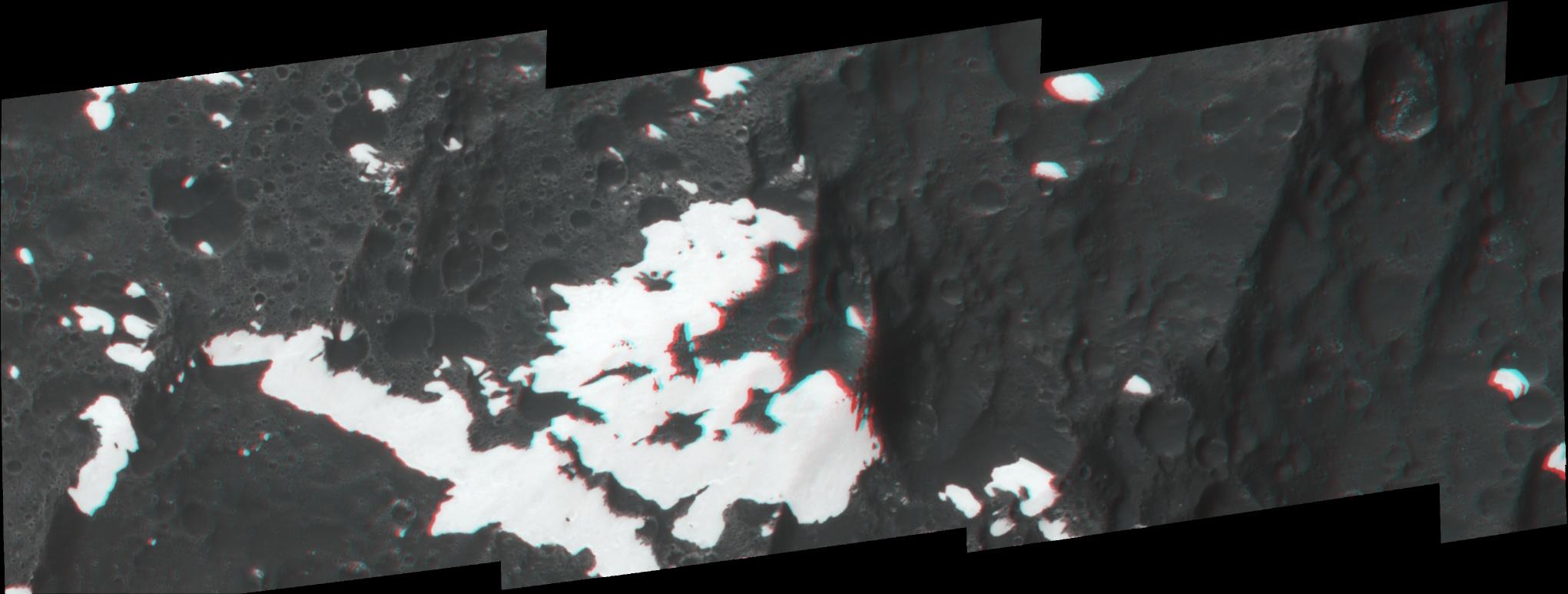 This stereo image, or anaglyph, shows huge mountains on Saturn's moon Iapetus