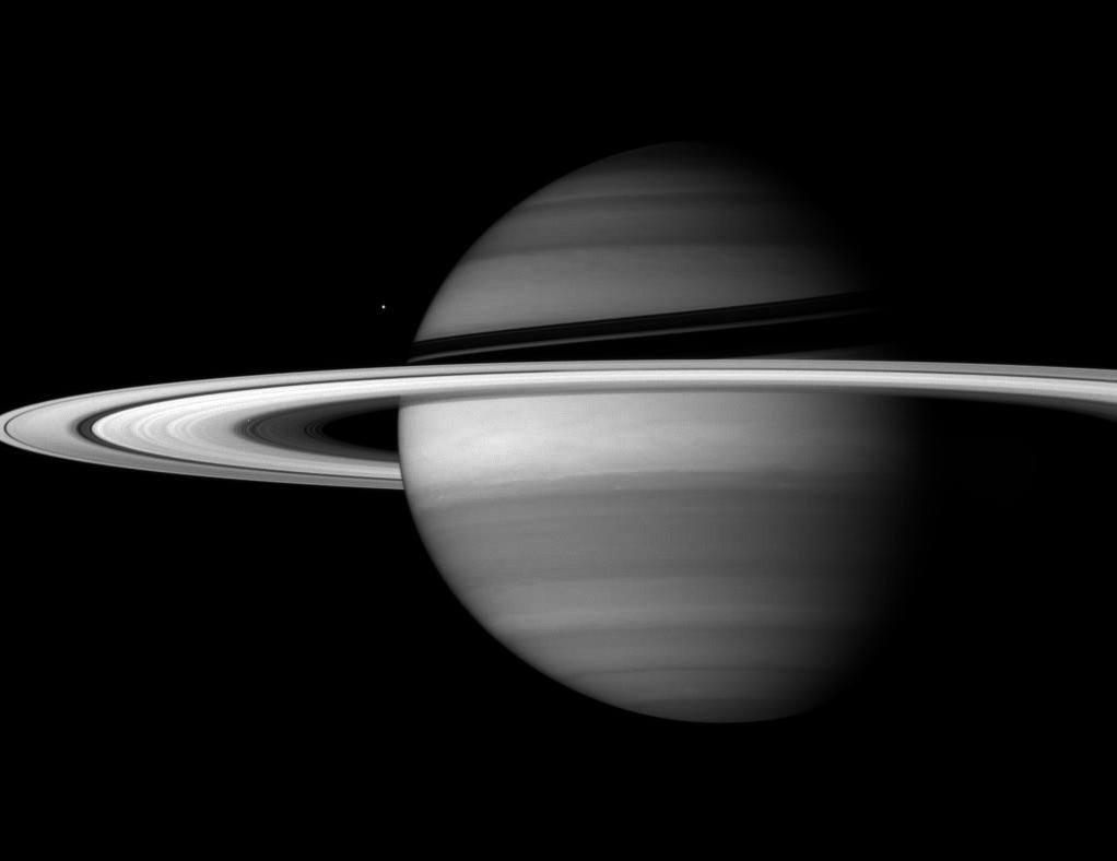 Saturn, its rings and the moon Enceladus