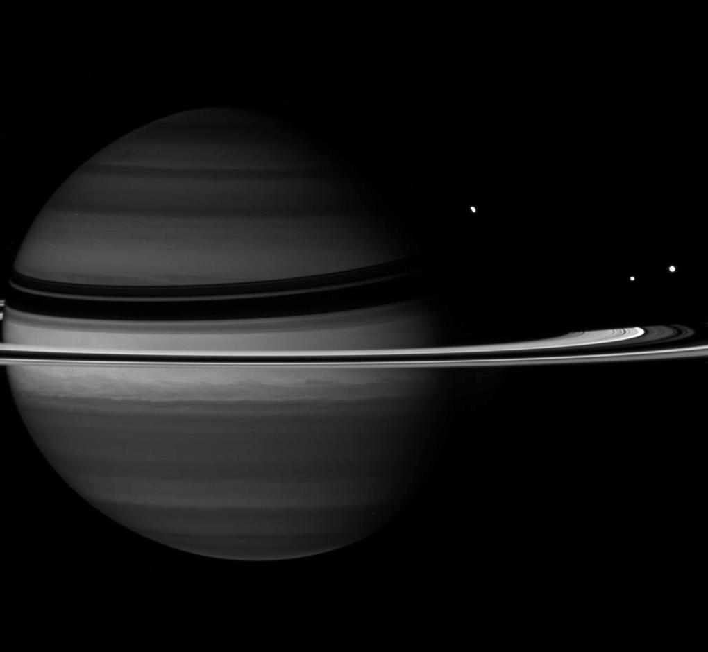 Saturn, Rhea, Enceladus and Tethys