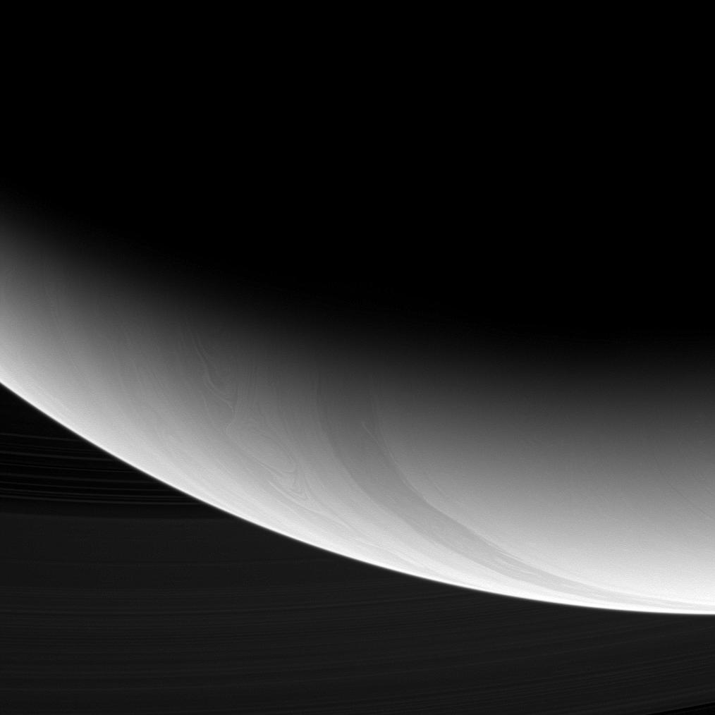 Intricate curlicues and circular patterns of storms swirl through the high latitudes near Saturn's south pole