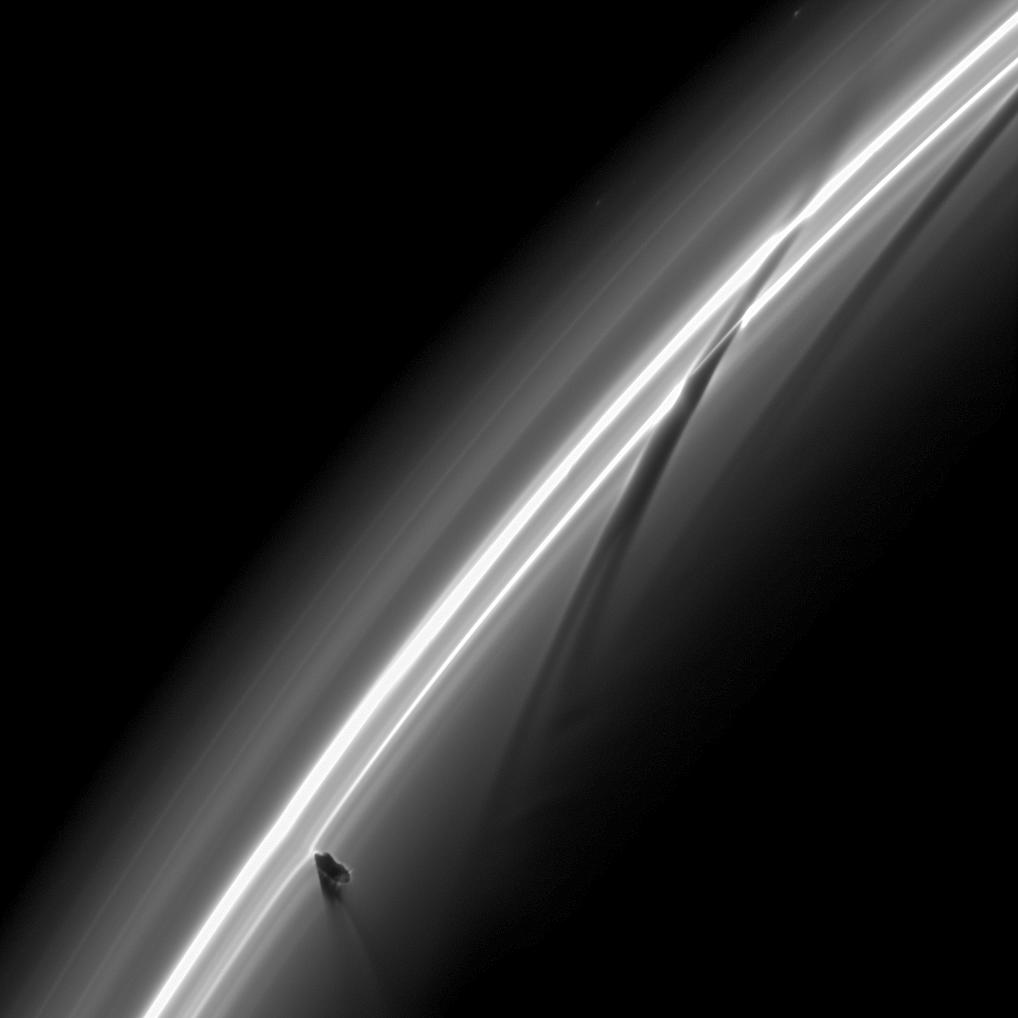Half an hour after Prometheus tore into this region of Saturn's F ring, the Cassini spacecraft snapped this image just as the moon was creating a new streamer in the ring.