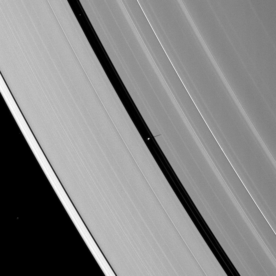 Saturn's moon Pan casts a delicate shadow onto the planet's A ring.