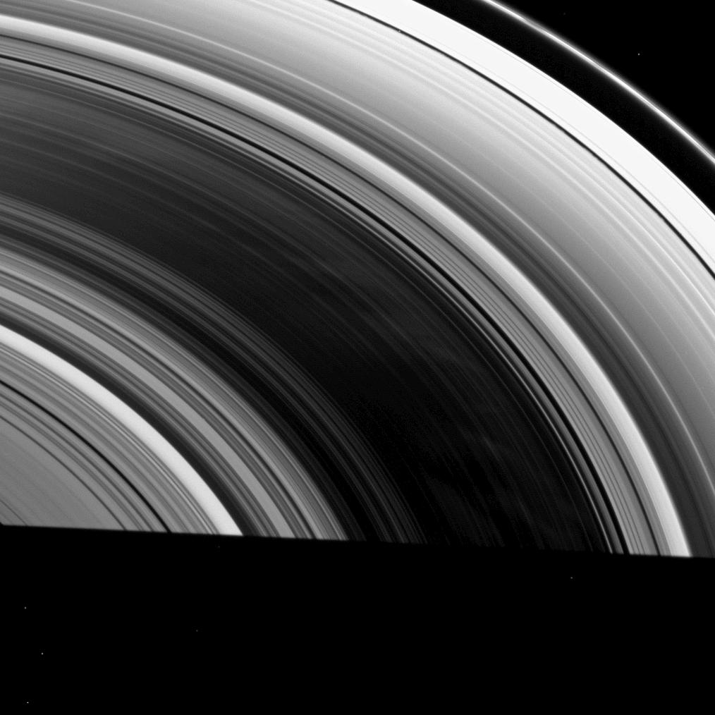 This high-phase image from the Cassini spacecraft shows dark areas separating faint spokes that are brighter than the rest of Saturn's B ring