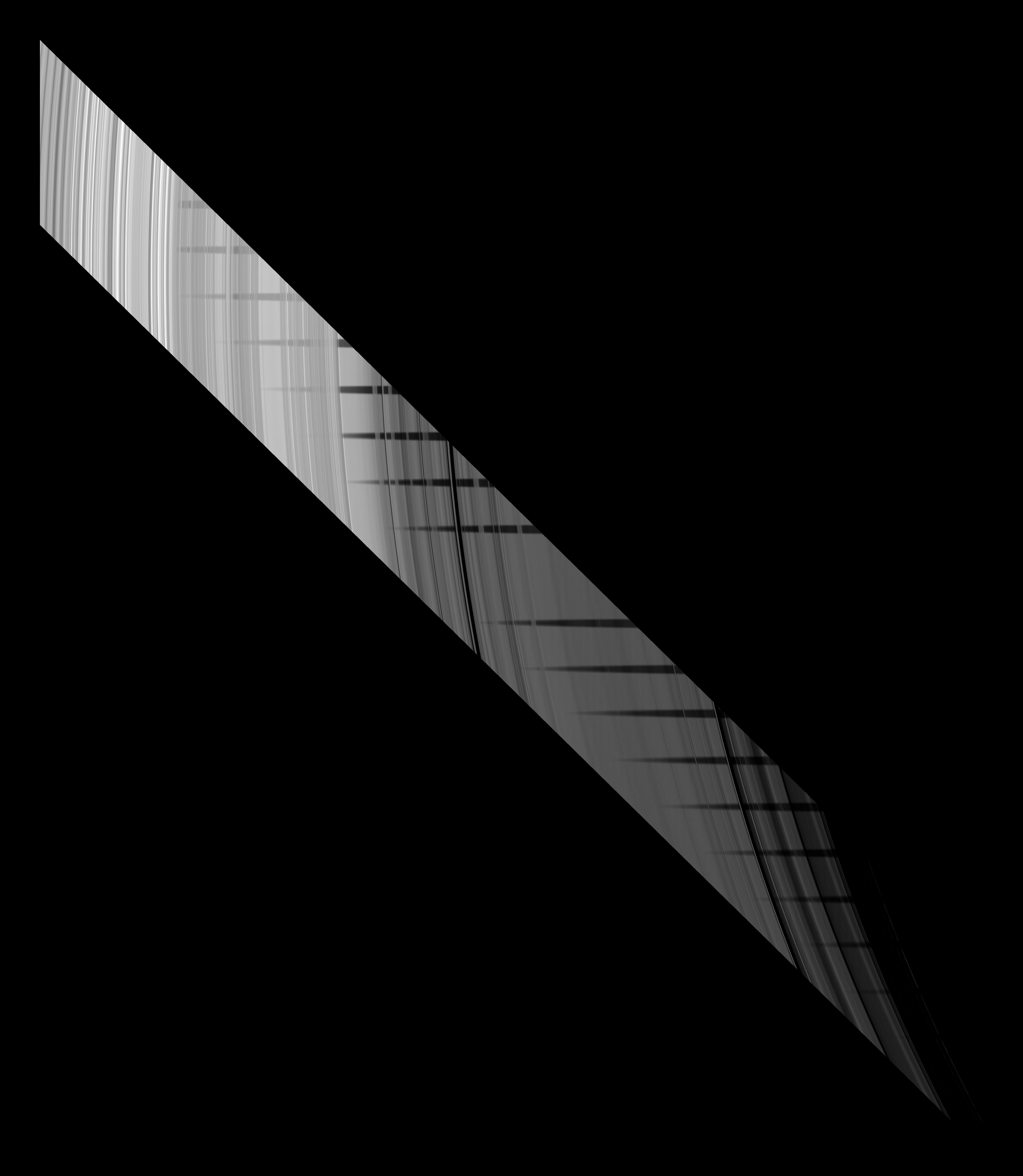 Part of the shadow of Saturn's moon Mimas appears as if it has been woven through the planet's rings in this unusual series of images from Cassini.