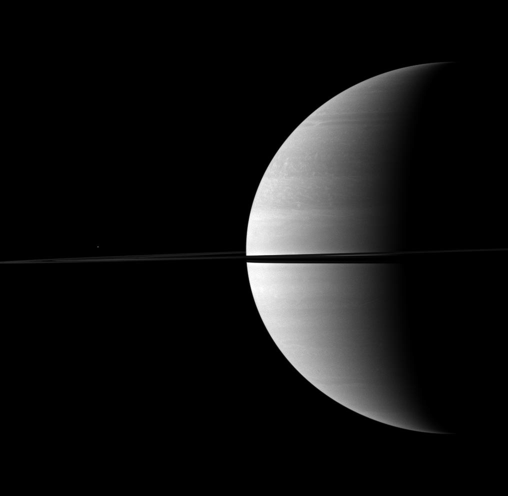 Saturn and Mimas above the rings