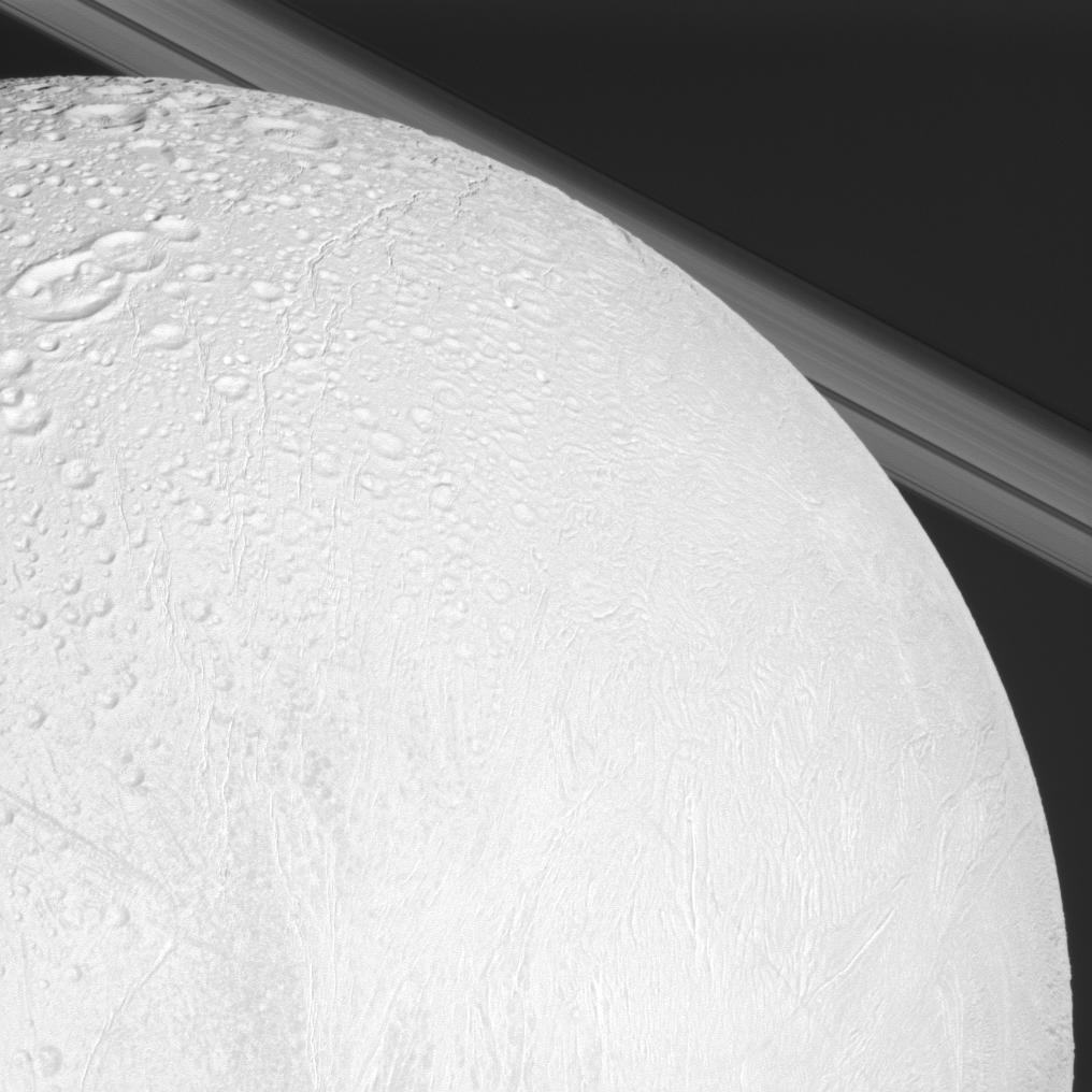 The Cassini spacecraft looks over cratered and tectonically deformed terrain on Saturn's moon Enceladus