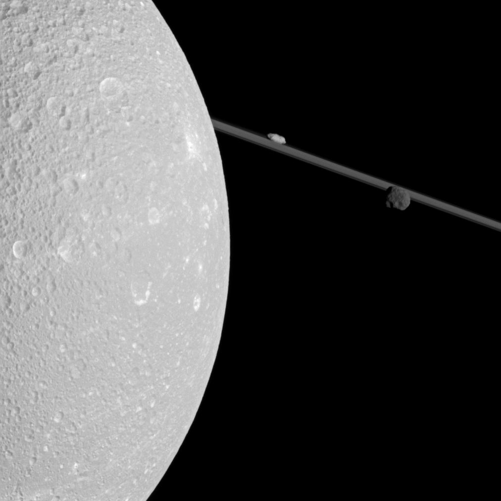 Dione, Epimetheus and Prometheus near Saturn's rings