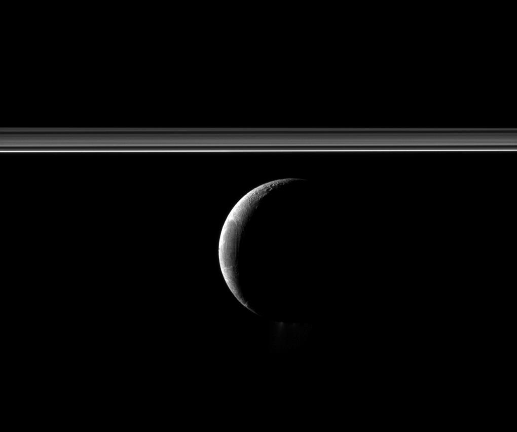 A crescent Enceladus and Saturn's rings