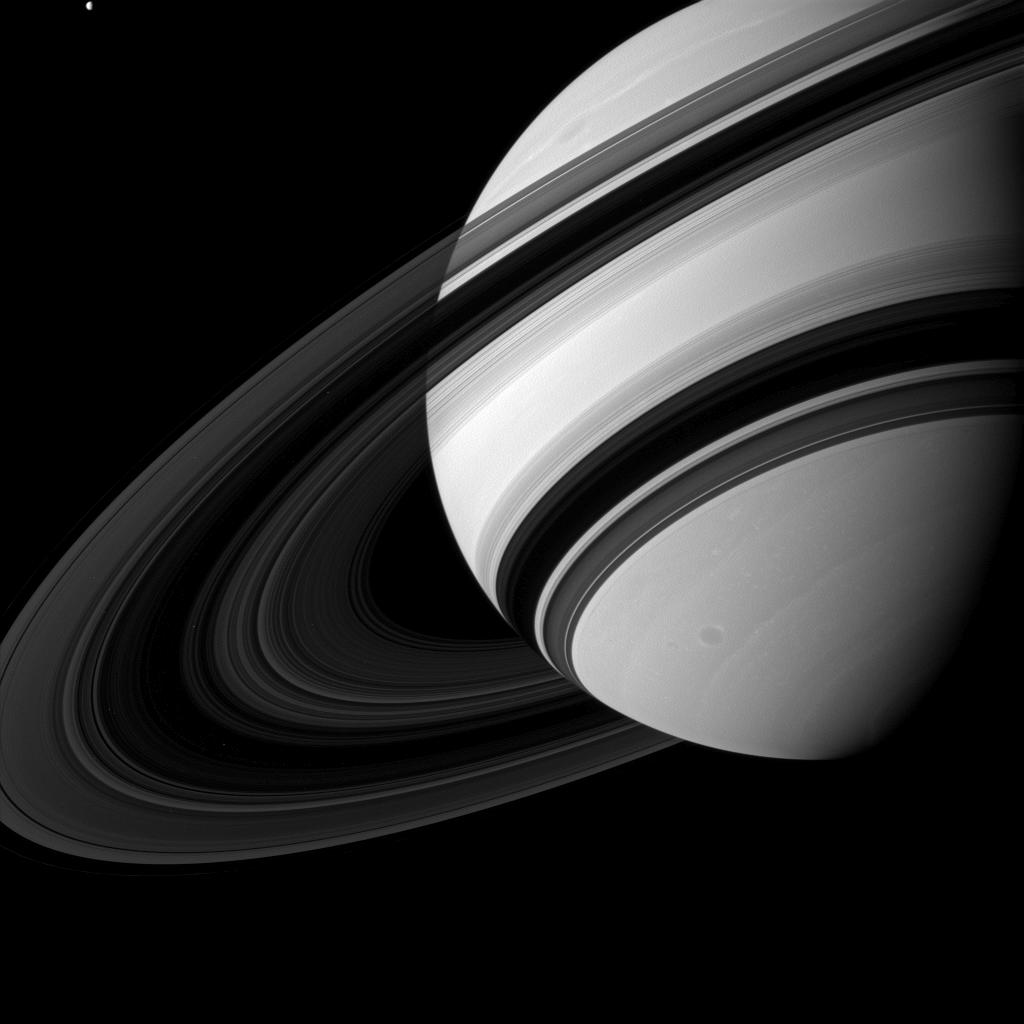 Tethys alongside Saturn