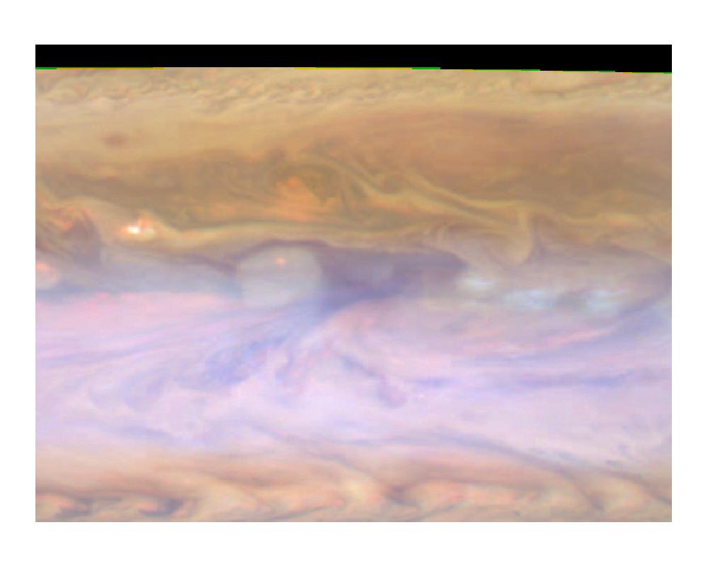 The dark hot spot in this false-color image of Jupiter's atmosphere