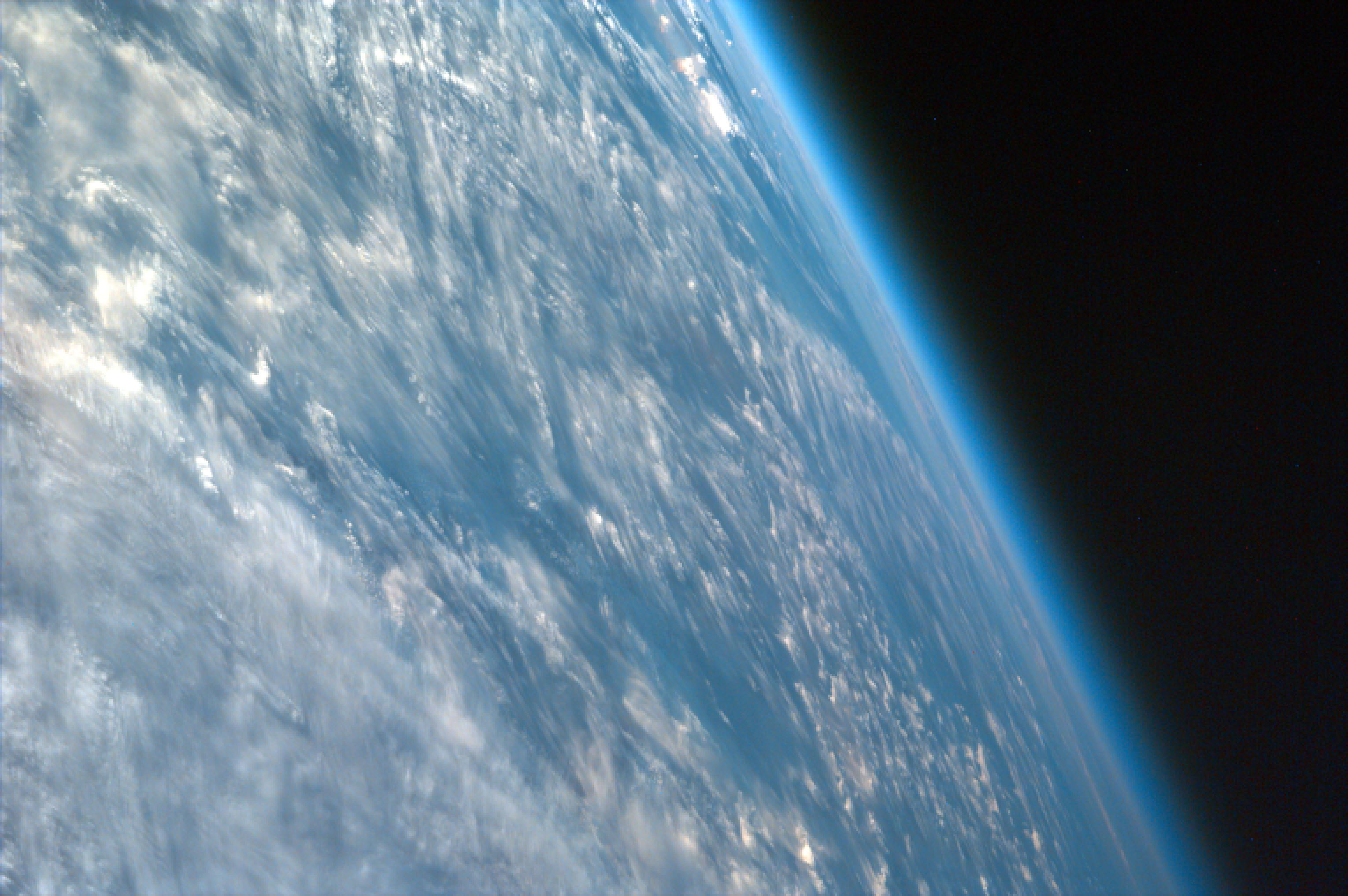 This highly oblique image shot over northwestern part of the African continent captures the curvature of the Earth and shows its atmosphere.