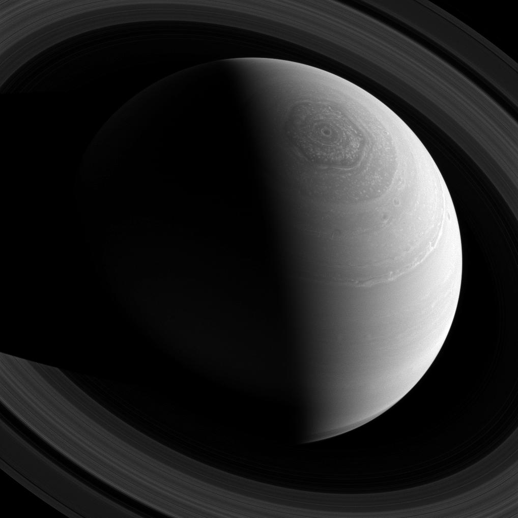 Saturn's hexagonal and rings