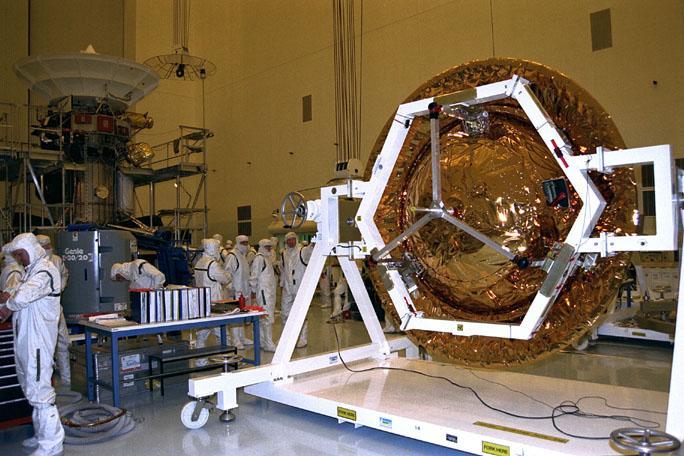 The Huygens probe is installed into the Cassini orbiter in the Payload Hazardous Servicing Facility