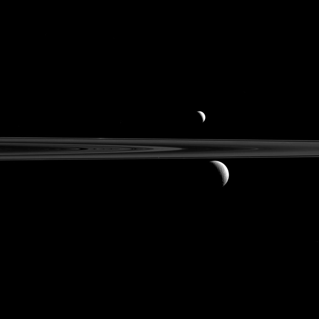 Saturn's F ring and Enceladus, Rhea and Atlas