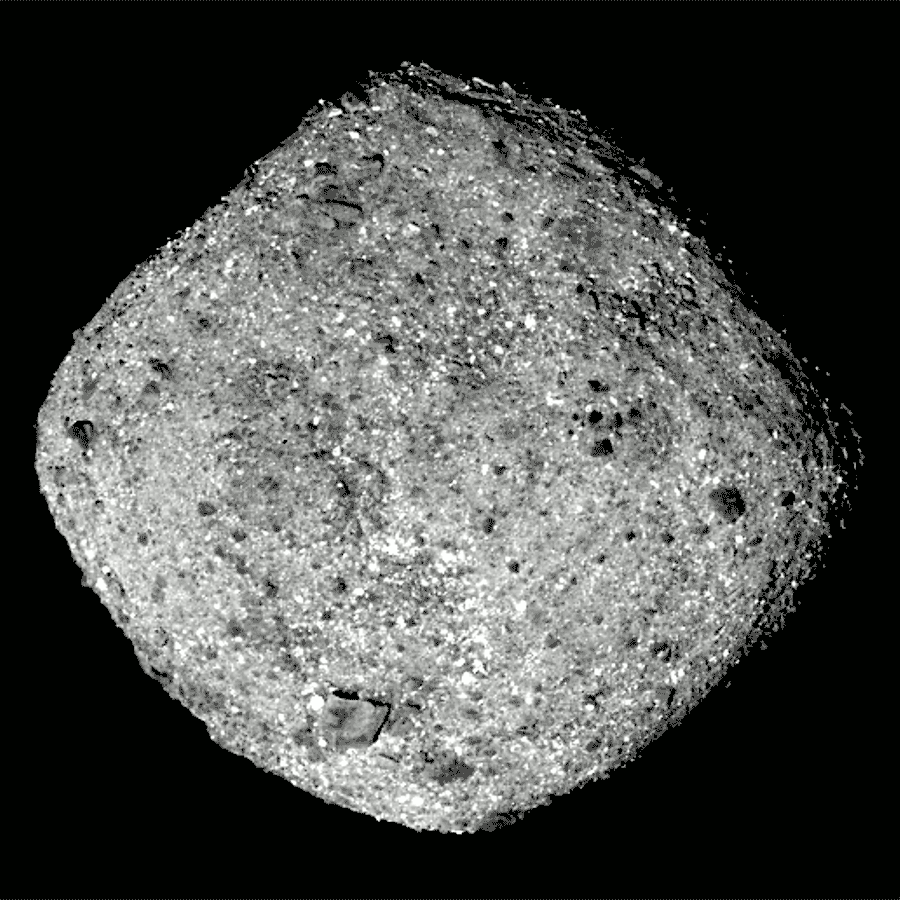 Close view of rock-covered asteroid rotating.
