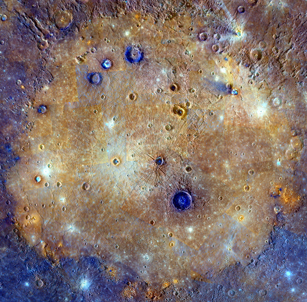 Color-enhanced view of giant crater from above.