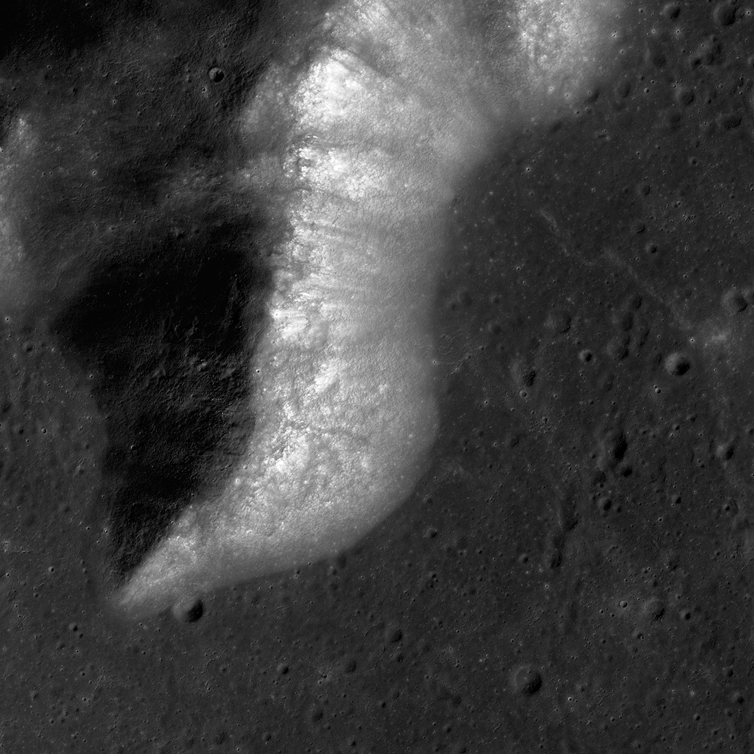 mountain ridge with craters seen from directly above