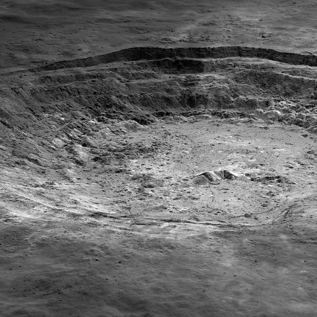 terraced sides of crater seen from an oblique angle