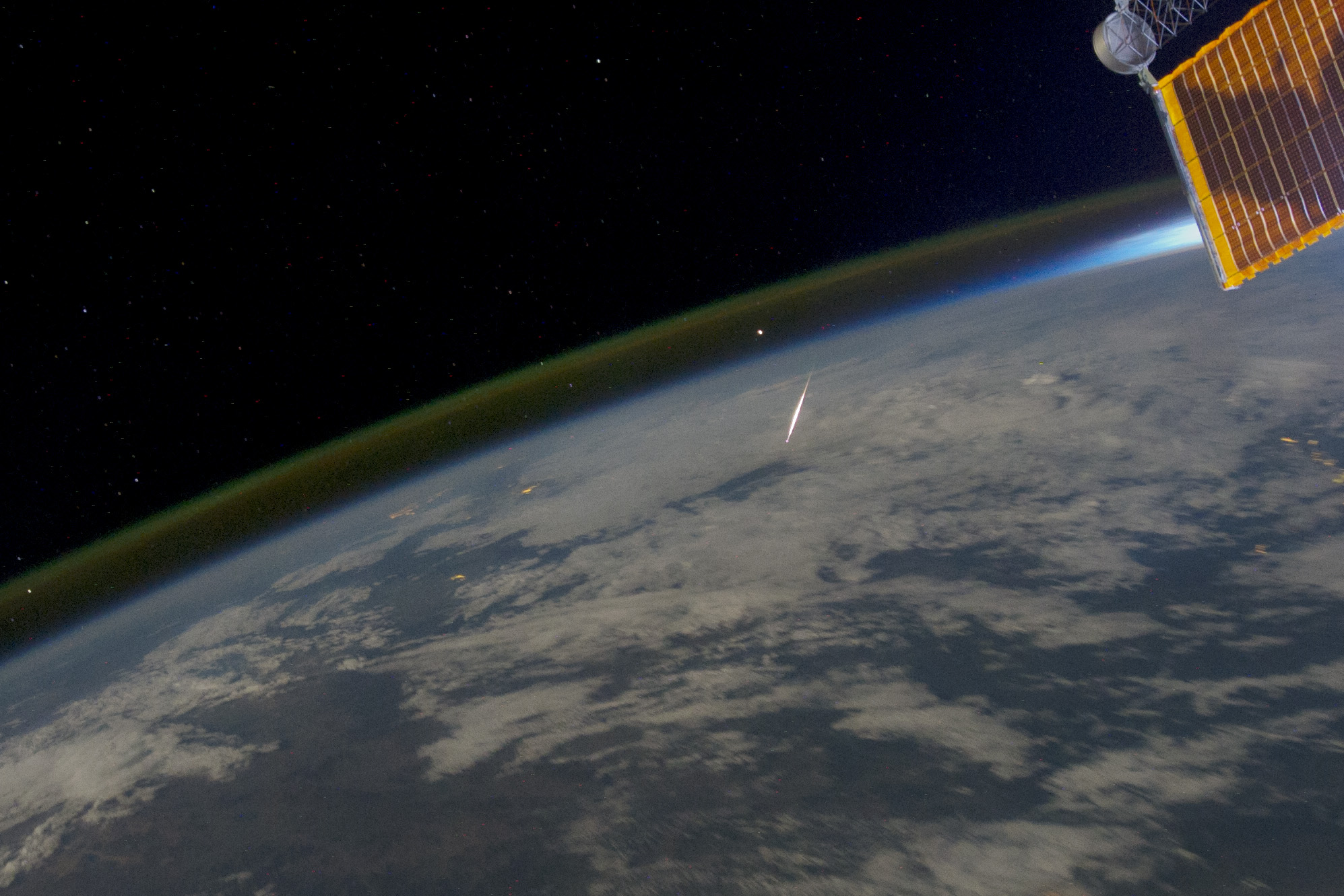 A rare photo of a meteor entering Earth's atmosphere as seen from the International Space Station.