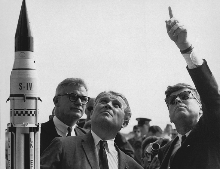 Dr. Wernher von Braun explains the Saturn V Launch System to President John F. Kennedy. 