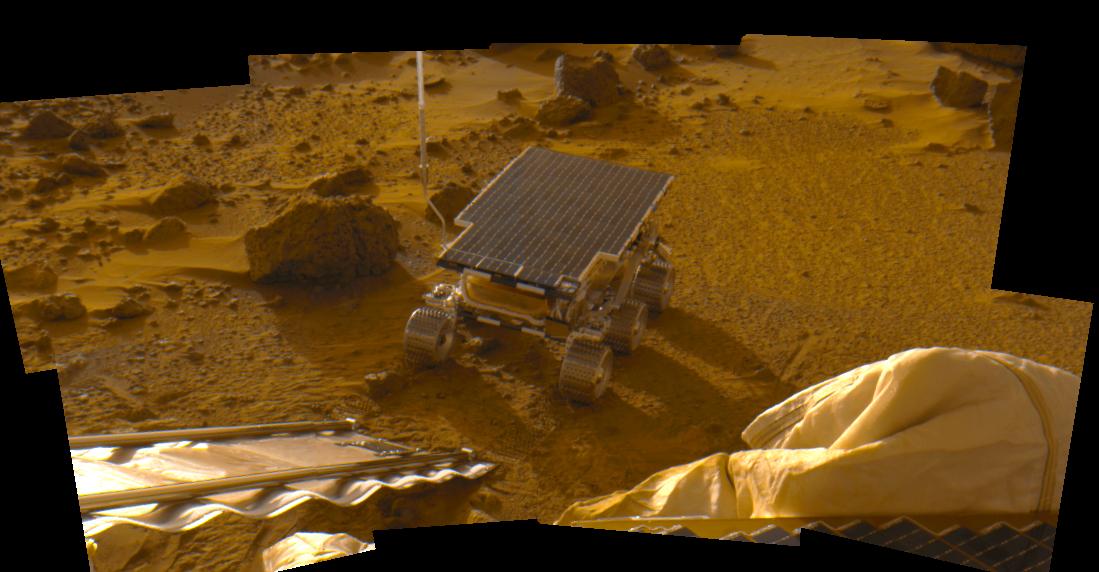 This 8-image mosaic was acquired during the late afternoon (near 5pm LST, note the long shadows) on Sol 2 as part of the predeploy "insurance panorama" and shows the newly deployed rover sitting on the Martian surface.